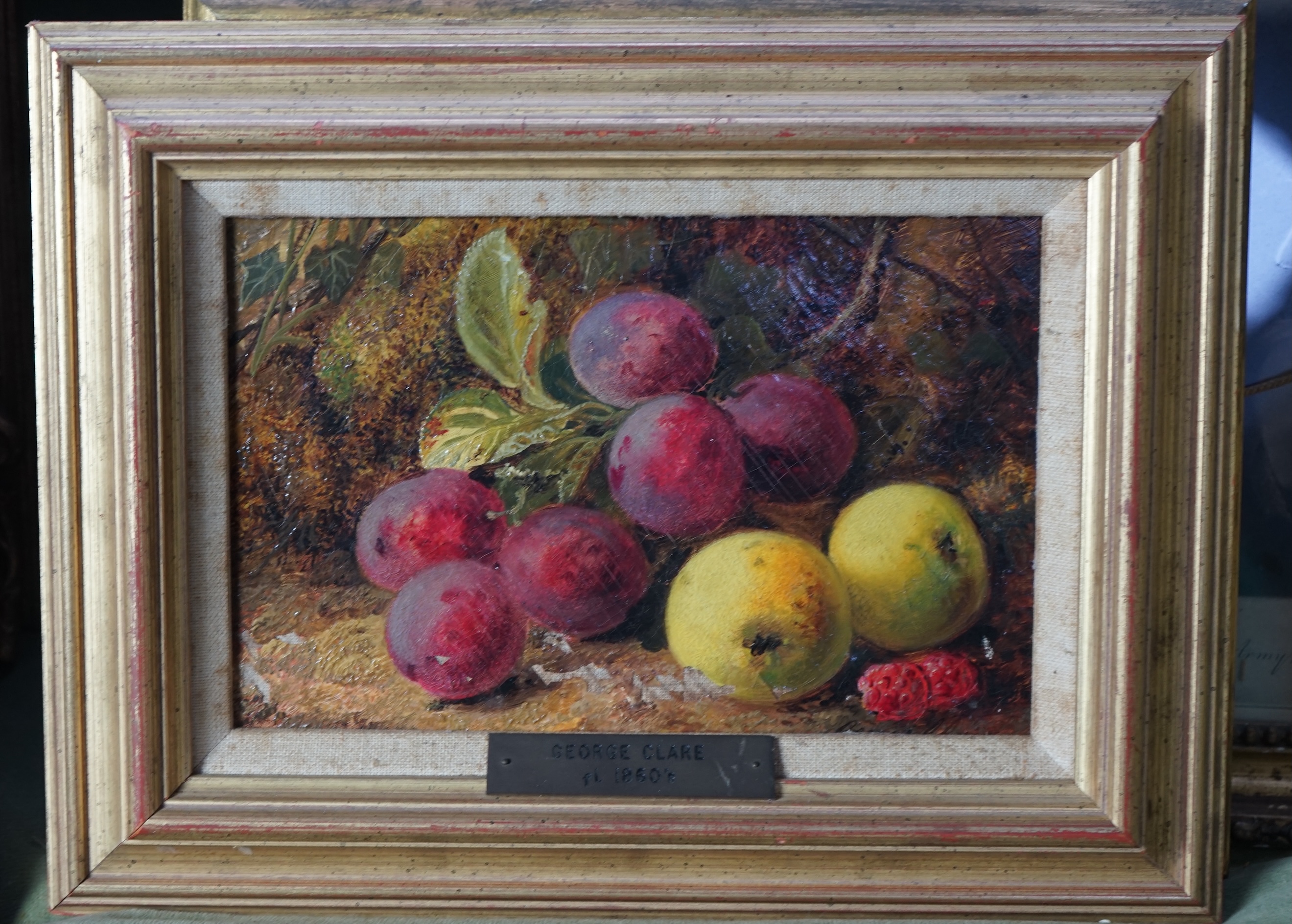 George Clare (English, 1830-1900), Still life of plums, apples and raspberries, oil on canvas, 15 x 23cm